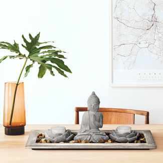 Buddha mit Teelichthalter und Dekosteinen Buddha mit Teelichthalter und Dekosteinen