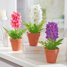 Kunstblume im Topf Hyazinthe flieder